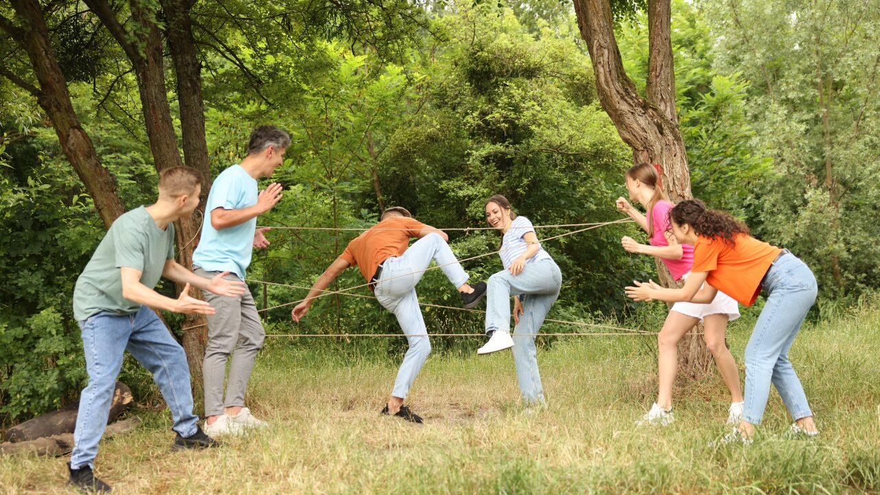 Team building spider web game outdoors